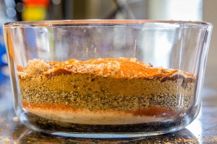 bbq rub ingredients layered in a bowl