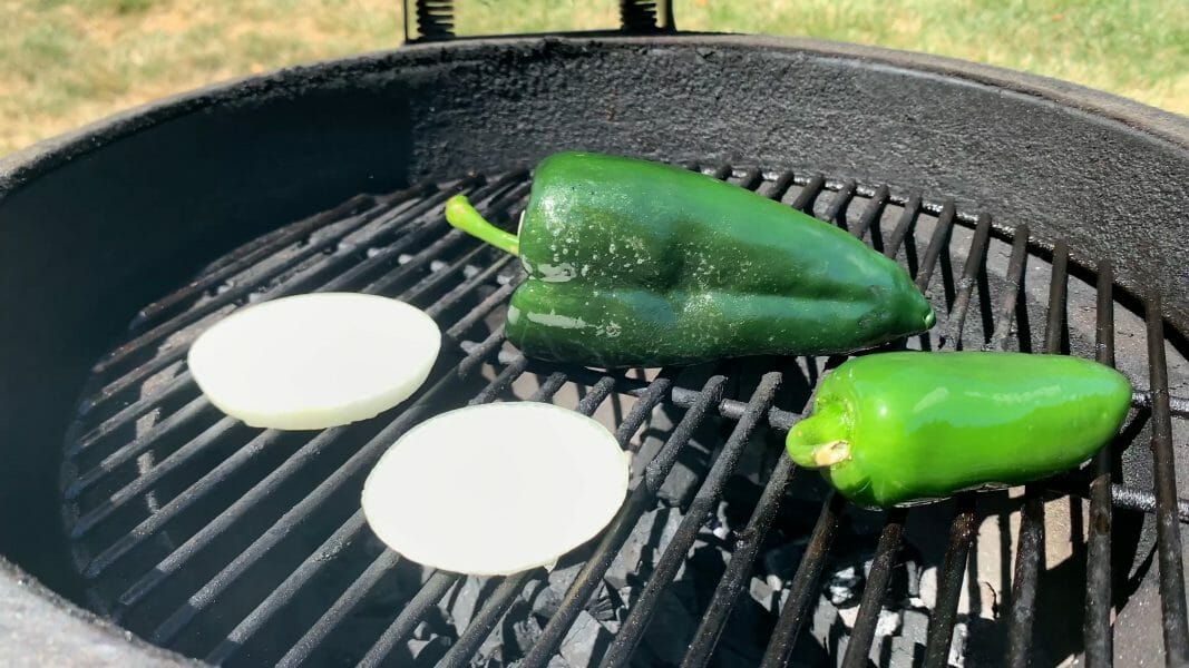 roasting peppers and onions on the grill