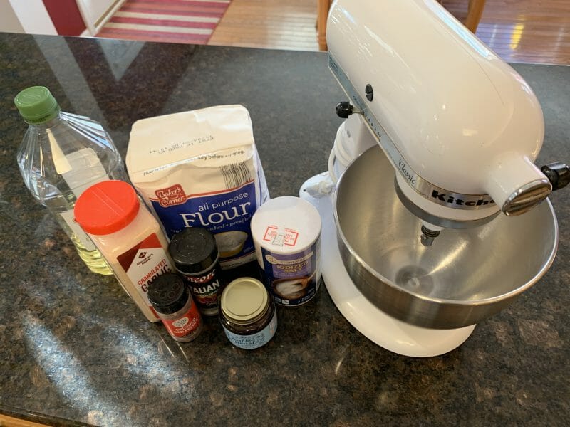 ingredients and mixer for pizza dough