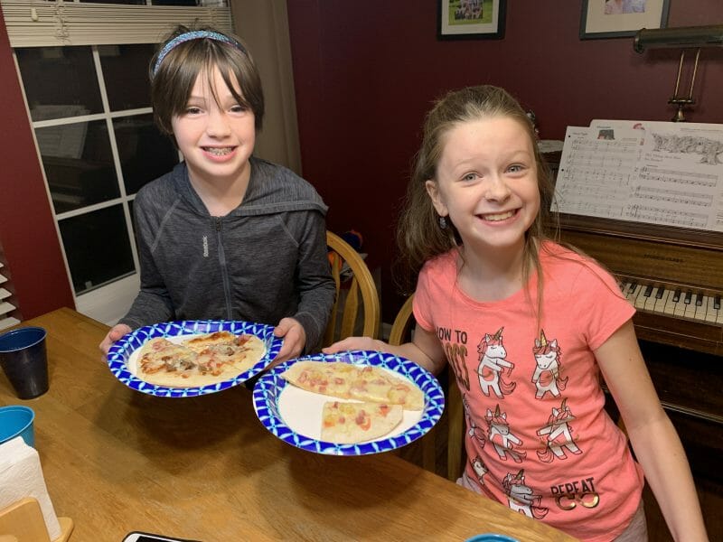 kids enjoying their grilled pizza creations