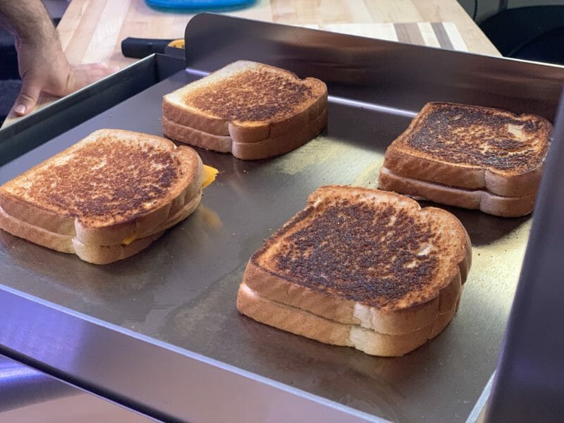 grilled cheese sandwiches cooking on the wee griddle