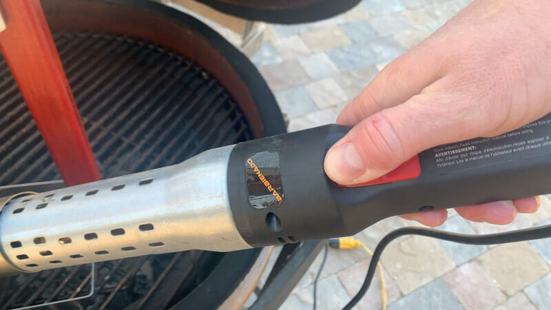 Barbienado-Firestarter-Thumb-holding thumb holding trigger of the Barbienado electric charcoal starter