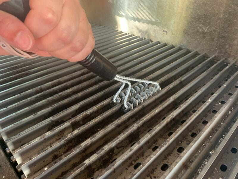 routine maintenance using cleaning tool to clean between the raised rails