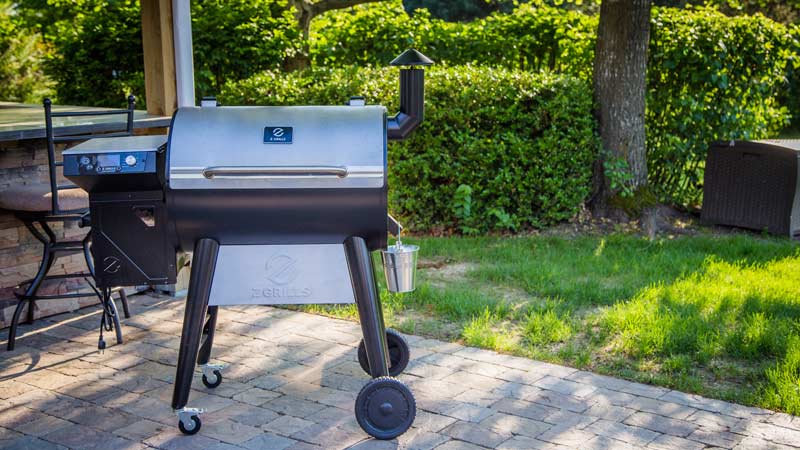 Z Grills wood pellet grill has stainless steel lids on the cooking chamber and pellet hopper