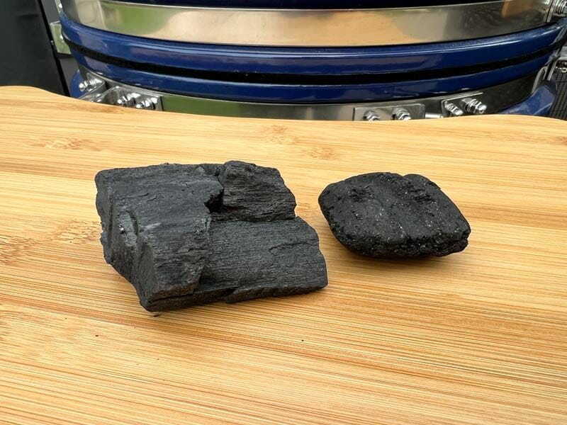 lump charcoal next to charcoal briquette