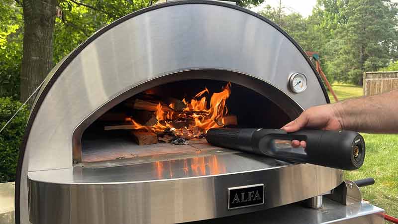 Looft Lighter X cordless electric fire starter can ignite wood in our outdoor pizza oven