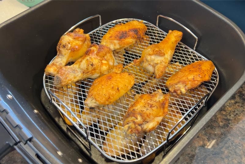 wings air fying in the Nuwave air fryer with second shelf