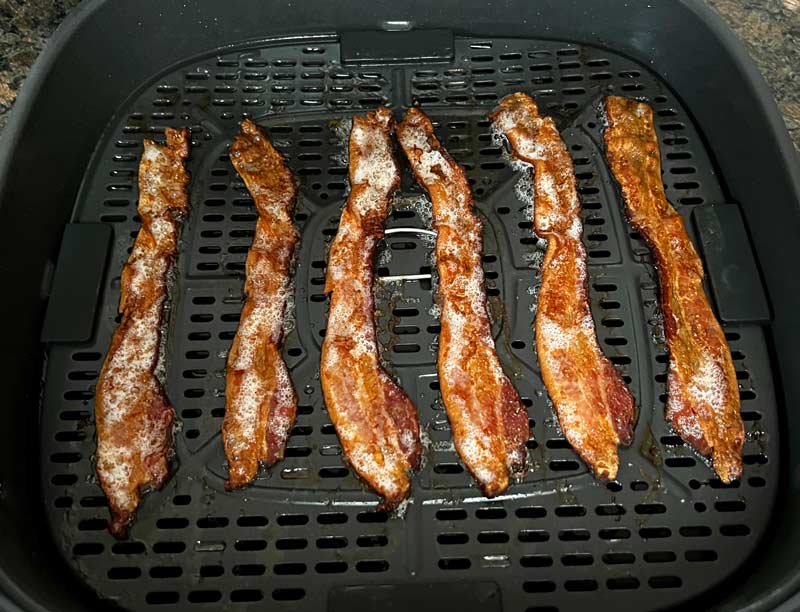 Typhur Dome 2 basket holding 6 slices of perfectly cooked bacon