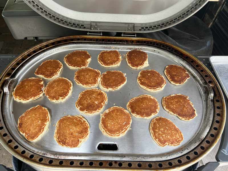 gluten-free-pancakes 17 pancakes cooking on the Solo Stove Steelfire griddle in a haphazard arrangement