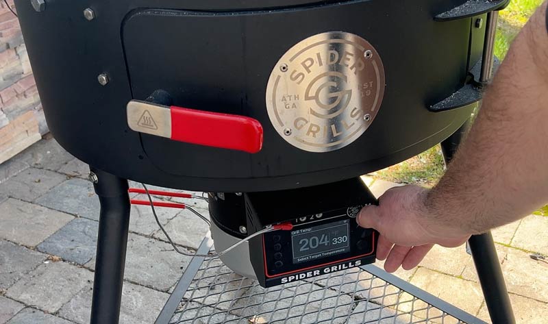 our favorite charcoal grill has a digital controller and fan to help with temperature control