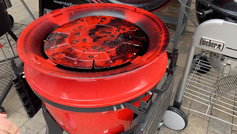 The kamado joe slo roller places a deflector in between the hot fire and the full cooking grate for indirect heat.