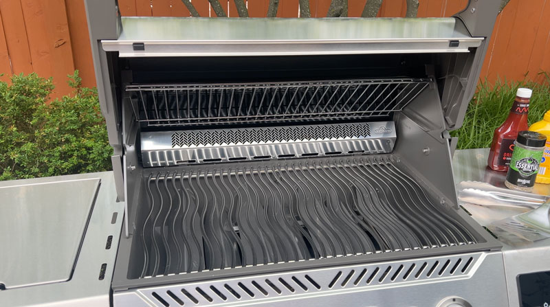 the stainless steel upper rack tucks away in the Napoleon Prestige gas grill