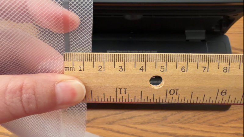 measuring the thickness of the seal