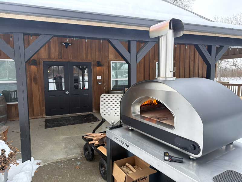 volta-4 fontana forni wood fired oven on a cold winter day