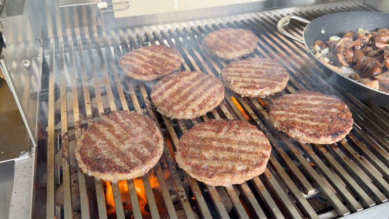 hamburgers and mushrooms grilled on the RCS cutlass elite grill