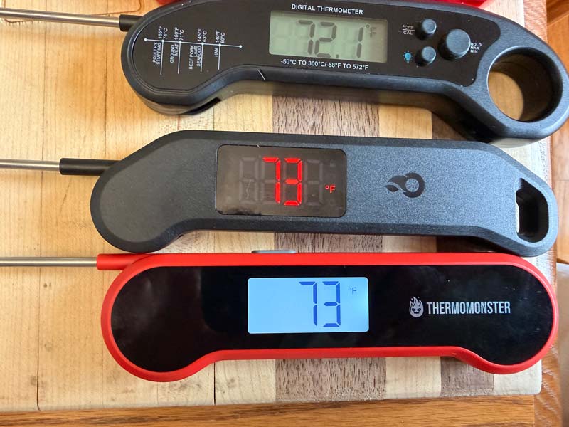 two budget instant read thermometers are registering temperatures to the nearest whole degree