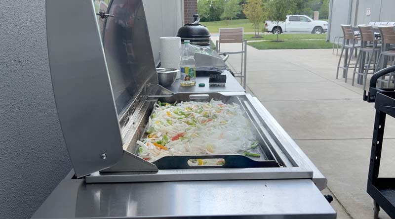 cooking peppers and onions on the Primate griddle