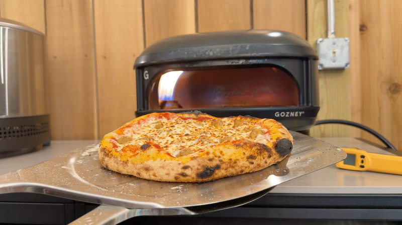 perfectly cooked neapolitan style pizza in the Gozney Arc Lite portable pizza oven.