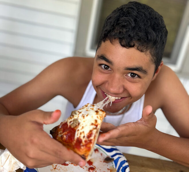 family pizza party while on vacation