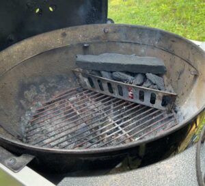 two-zone cooking setup of the Weber charcoal kettle grill