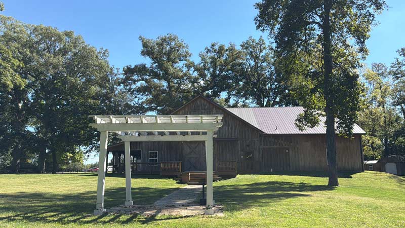 concrete pad with rotting wood pergola was the location for our DIY fire pit